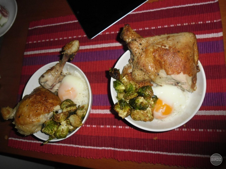 confit crispy chicken legs with an slow poached egg, rice and deep fried brussel sprouts 