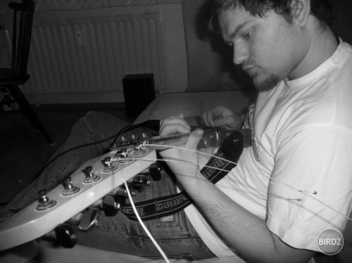 Maťo playing on guitar