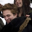 A giggling Edward and Bella